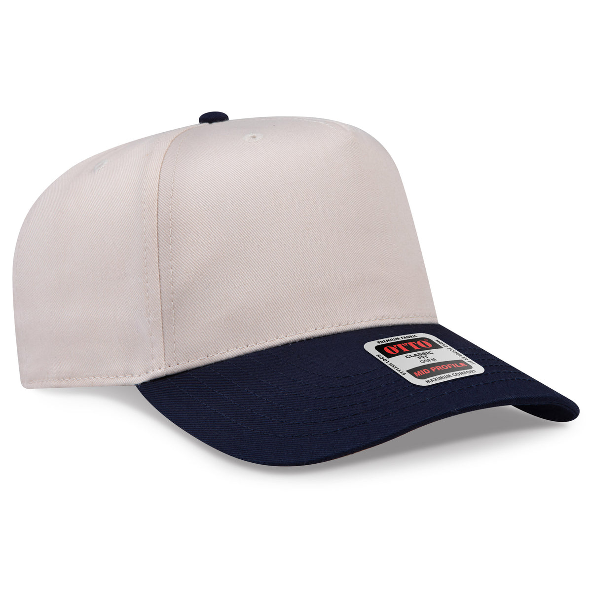 Two-tone beige and black cap with a brand label on a white background